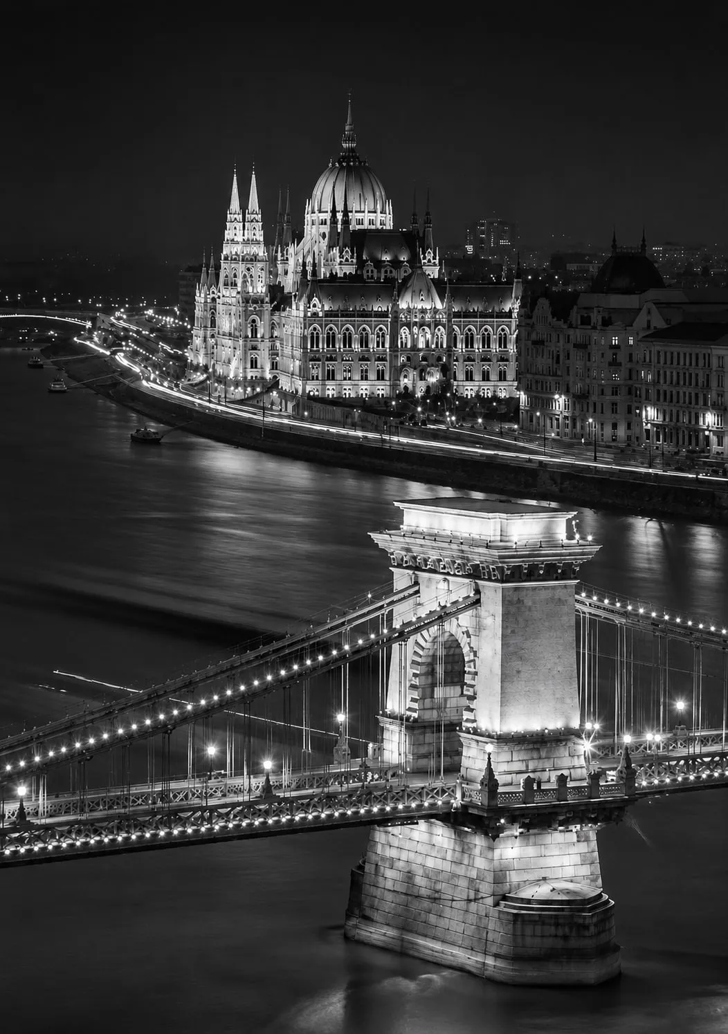 The Hungarian Parliament and the Chain Bridge over the Danube, Budapest, at night.